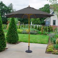 Spend a memorable time outdoors with square garden parasols to protect you from the elements. Nova Dominica Deluxe Wooden Garden Parasol