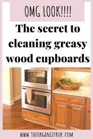 We'll walk you through general cleaning tricks, plus offer ideas for specific stains and different fortunately, a few easy tricks for cleaning kitchen cabinets can help you tackle all types of issues, including grease stains and sticky cabinets. How To Clean Sticky Wood Kitchen Cabinets The Organizer Uk Wooden Kitchen Kitchen Cupboards Wood Kitchen Cabinets