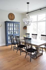 Modern Farmhouse Kitchen With Navy Blue China Cabinet Farmhouse Table And Black Windsor Trendy Farmhouse Kitchen Modern Farmhouse Dining Room Farmhouse Dining