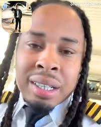 A 24-year-old pilot, known as Young Mula is going viral after celebrating a  successful flight landing. He walks through the airport in his uniform and  thanks God for his success, saying, "Dealing