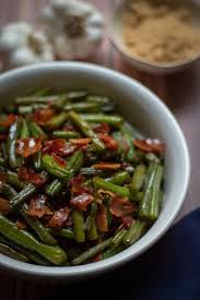 This Bacon And Brown Sugar Arkansas Green Beans Recipe Uses Soy Sauce And Garlic In Its Sweet Buttery Glaze Coa In 2020 Arkansas Green Beans Green Beans Bean Recipes