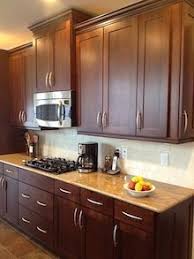 A client will buy the cabinet colour package and in the questionnaire, you're asked to note which countertop you've chosen. Choosing Kitchen Cabinets Bob Vila