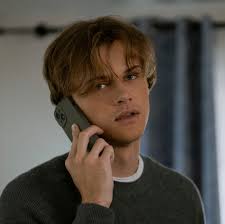 Does Conrad look better with or without facial hair?