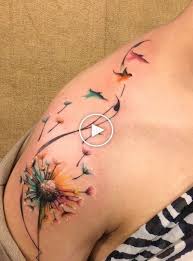 Feather With Birds Flying Away Tattoo Tattoo Swallows Flying Away From A Dandelion Flower Shoulder Tattoos For Women Feather Tattoos Dandelion Tattoo Design