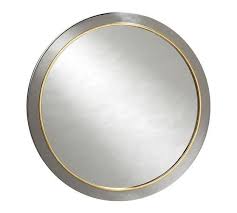 This artistic rectangular mirror with repeated pattern in a painted gold finish has a very distinctive design providing a decorative and beautiful accessory for your home. Evelyn Polished Silver And Gold Round Wall Mirror