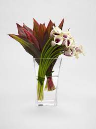Picasso Calla And Red Thai Ti Leaves By L Oliever Floral Atelier Hotel Flowers Flower Arrangements Corporate Flowers