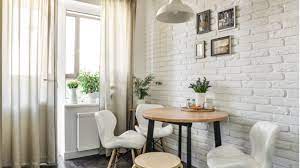 Floating a small dining room table in the center of the room, as you can see in this small space, can make the room feel loftier and more elegant. 5 Clever Ways To Create A Dining Room In A Small Apartment Rentcafe Rental Blog