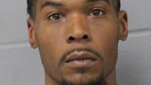 Man robbed at gunpoint in his car at the Domain, suspect charged