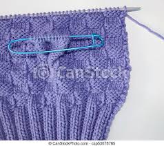 Yarnspirations has everything you need for a great project. Basket Weave Pattern Knitted On Knitting Needle In Lilac Color Wool Stitch Holder In Place Marking Off Extra Stitches To Be Canstock