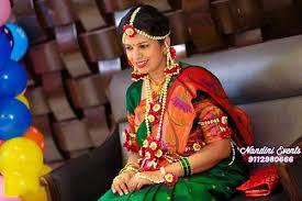 It celebrates the delivery or expected birth of a child or the transformation of a woman into a mother. Beautiful Fresh Flower Jewellery Real Flower Jewellery In Pune Party Organisers Dohale Jevan Bab Fresh Flower Jewelry Flower Jewellery Real Flower Jewelry