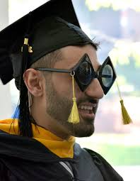 Becker graduates hear cautionary tale of 'twin tsunamis'