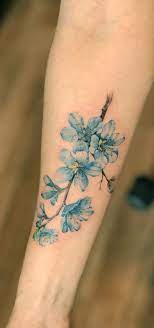 Blue Flowers Tattoo By Jay Shin Black Fish Tattoo Nyc Blue Flower Tattoos Flower Tattoo Shoulder Flower Tattoos