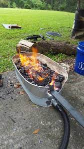 My setup allows me to let the steel heat up and cook the. Homemade Charcoal Forge In Action Homemade Forge Forging Metal Metal Working