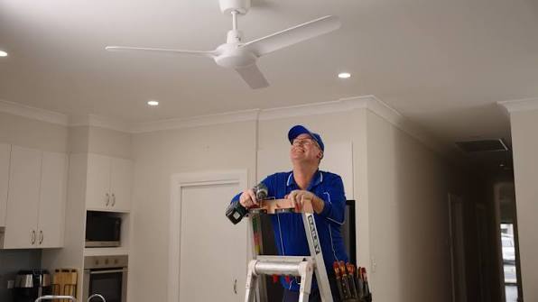Feature pendant lighting fitted in a Belvedere dining room