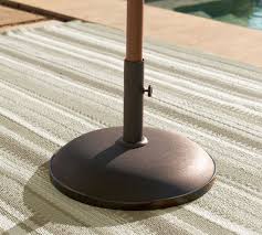 4 add water to make the concrete mix the consistency of mud. Concrete Umbrella Base Umbrella Stands Pottery Barn