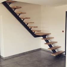 Un Escalier Limon Central Quart Tournant Avec Palier Stairs Escalier Limoncentral Acierbois Metalbrut Artisa Metal Stairs Interior Stairs Escalier Design