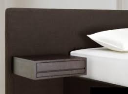 Simple, light bedside tables, perfect for organising the bedroom. Buying Beside Tables That Certain Something Swissflex