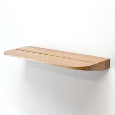 Vous n'avez qu'à jeter un œil dans l'étagère ne se contente plus d'être une simple planche en bois avec équerres ou tasseaux fixés au mur. Tablette Murale En Bois Massif
