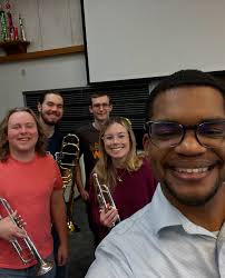 Five members of the trumpet studio are enjoying their time