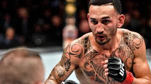 Max holloway and calvin kattar kick off 2021 and the ufc's latest run of events on fight island with the men's featherweight main event of a matinee ufc fight night on saturday in abu dhabi, united arab emirates. Ufc Fight Night Max Holloway Vs Calvin Kattar 2 Bets To Set Bigonsports