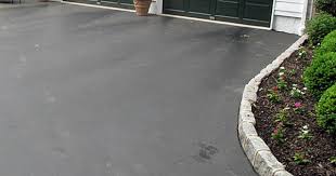 If you're a diy homeowner looking to make repairs for the very first time, let us assure you that the process really isn't that difficult as long as your asphalt driveway is in decent condition. Dress Up Your Asphalt Driveway With Cobblestone Paver Edging Asphalt Driveway Paver Edging Cobblestone Driveway