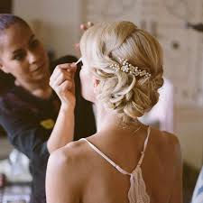 who pays for hair and makeup on wedding