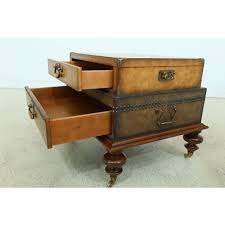 A key to using wicker trunks for coffee tables is positioning them so they're functional. Stacked Leather Trunk Style Coffee End Table Chairish