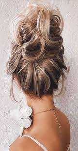 Pull your hair into a high ponytail secured in place with a hair tie. Updo Hairstyles For Your Stylish Looks In 2021 Textured Top Bun