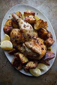 Place chicken quarters on prepared baking sheet. The Best Greek Chicken And Potatoes Heather Christo