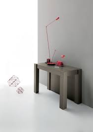 The extensions are hidden within the console for better storage. Duo Console Dining Table Shop Valitalia