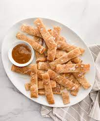22 amazing things you can do with pizza dough · breadsticks · buffalo chicken bites · crackers · cinnamon rolls · garlic knots · apple galette. Cinnamon Breadsticks Weight Watchers