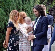 Brand's path to divinity does not involve childcare, which he says he leaves to his wife. Russell Brand Welcomes Second Daughter With Wife Laura Gallacher