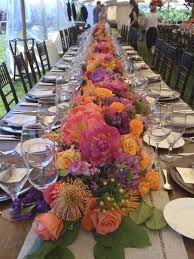 Today's unique weddings are using more and more family style glass jars that our grandmothers use to use for canning are now used for flowers on the table. Wedding Wednesday Long Table Decor Flirty Fleurs The Florist Blog Inspiration For Floral Designers