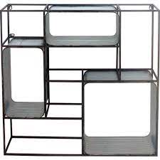 Nombreux sont enfin celles et ceux qui utilisent l'étagères métalliques avant tout comme support propice à décorer une pièce de la maison. Etagere Box 8 Casiers Marque Athezza Support Mural Carre Decoratif Style Industriel En Acier Et Zinc 14x80x80cm L Heritier Du Temps