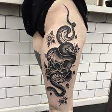 New tattoos by matt decker and a custom bike helmut! Snake Skull Thigh Tattoo By Parliament Tattoo