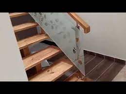 The contrast between glass and wood creates a unique railing design. Staircase Wood Handrails Work With Glass Kochi Kerala Youtube