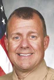 Eyeing exit, sheriff re-shuffles top staff