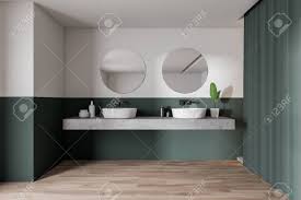 Put it on all four walls, but stop the colour looking flat by positioning white fittings and fixtures against it and a few glistening. Interior Of Stylish Bathroom With White And Green Walls Wooden Stock Photo Picture And Royalty Free Image Image 124086734