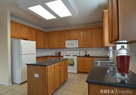 help update 1990s oak cabinets in a