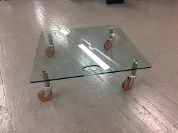 Don't worry, armed with these tips, purchasing an excellent coffee table may be fun and even inspiring, you may find an excellent coffee table for your space. Z11 Glass Coffee Table With Handle Wood Capped Casters Lexington Lexington