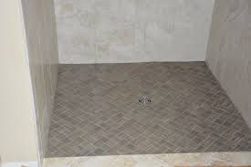 Bathroom tile is where fashion meets function. Basketweave Shower Floor On Diagonal Anatolia Eramosa Natural 2x2 Shower Floor Shower Bath Shower Wall