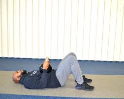 Kettlebell Sit Up With Reach Start By Lying On Your Back On The Floor With Your Knees Bent Hold The Kettlebell Kettlebell Training Kettlebell Kettlebell Set
