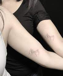 The connecting butterfly wings on their wrists match up to form one gorgeous design when put together. 33 Best Friend Tattoos Matching Tattoo Ideas For Your Bff