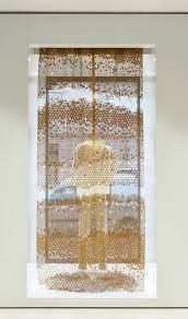 Oma Maison Ullens Flagship Store Interior Paris The Curtains At The Maison Ullens Boutique Are Made From Tiny Store Interiors Retail Store Interior Curtains