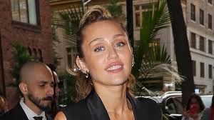 The latest miley cyrus stuns in zipper dress news, videos & comments