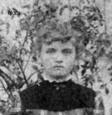 Nora C. Travis (1878-1895)