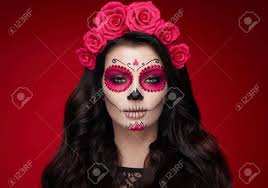 Maybe you would like to learn more about one of these? Portrait Of A Woman With Sugar Skull Makeup Over Red Background Stock Photo Picture And Royalty Free Image Image 130723595