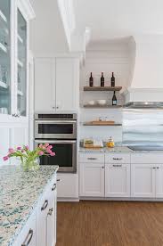 Kitchen Ideas Kitchen Features Glass Front Upper Cabinets And White Lower Cabinets Paired With Turq Glass Countertops Interior Design Kitchen Kitchen Interior