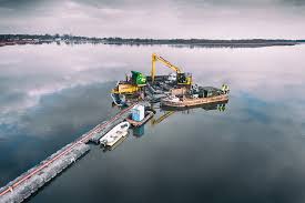 Definition of dredge (entry 3 of 3). Dredging