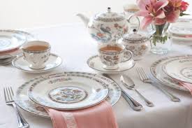 Put chamomile tea into the teapot and add hot water. The Complete Table Asian Inspired Teatime Magazine